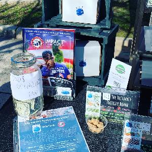 The TAPS donation section of our farmers market fundraising table in collaboration with BrainSnac!